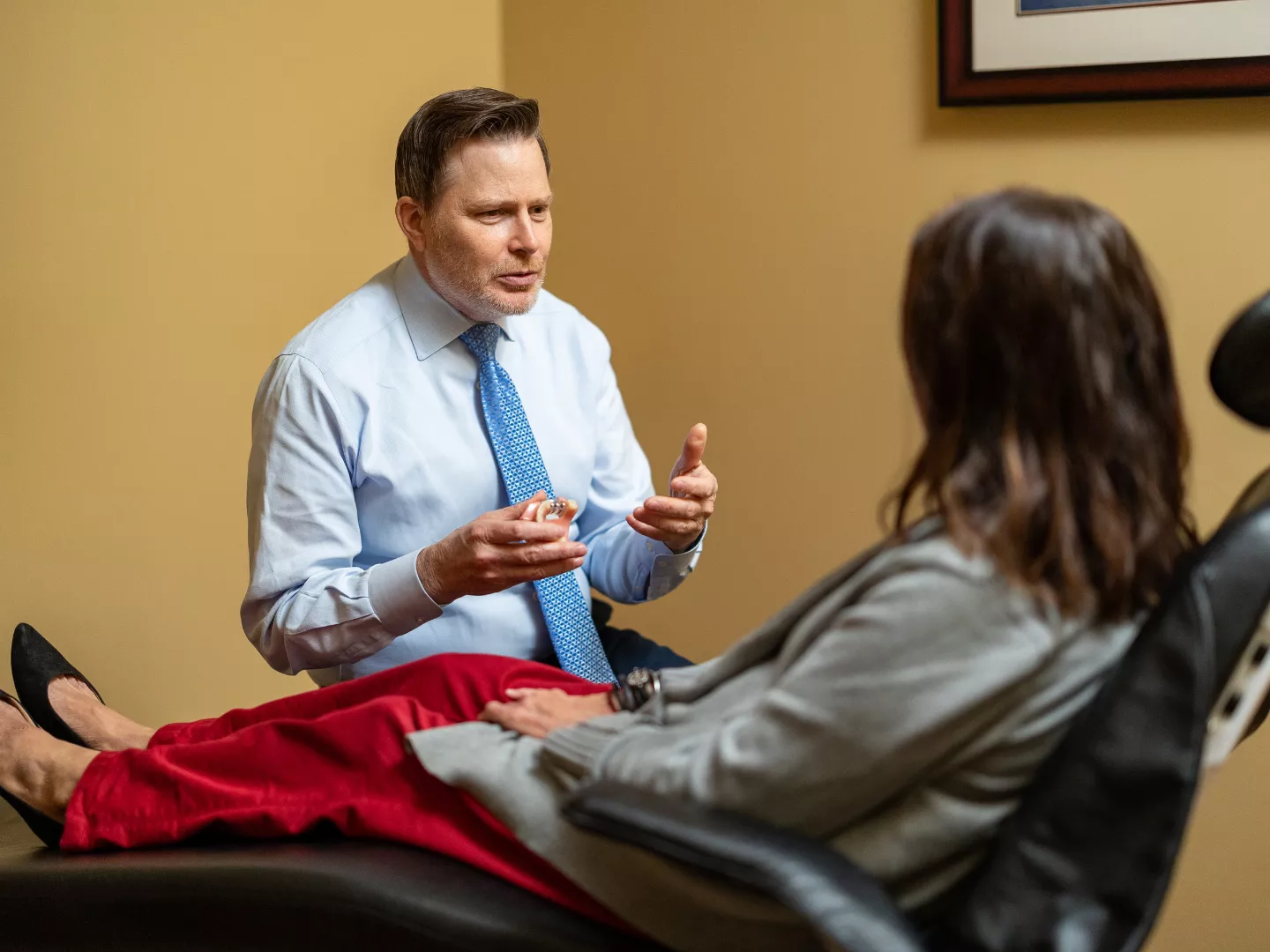 Dr. Clark consults with a patient.