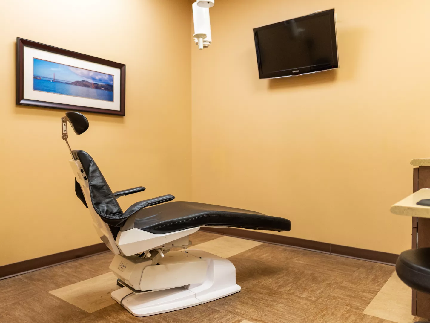 Interior of our exam room with empty chair.