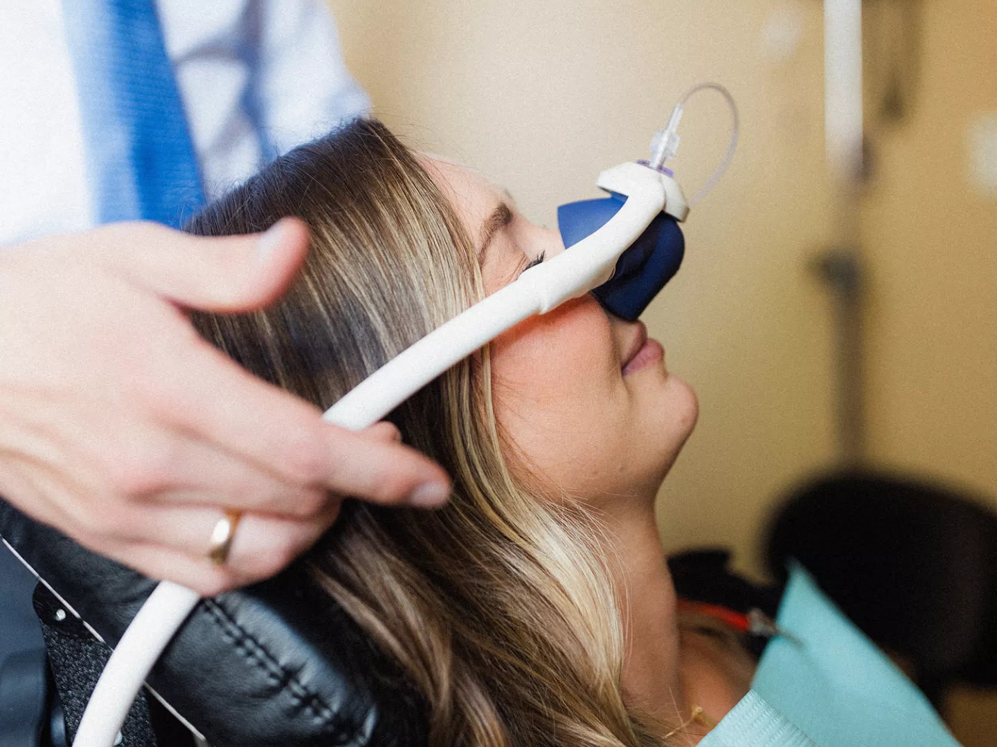 A patient wearing a sedation mask.